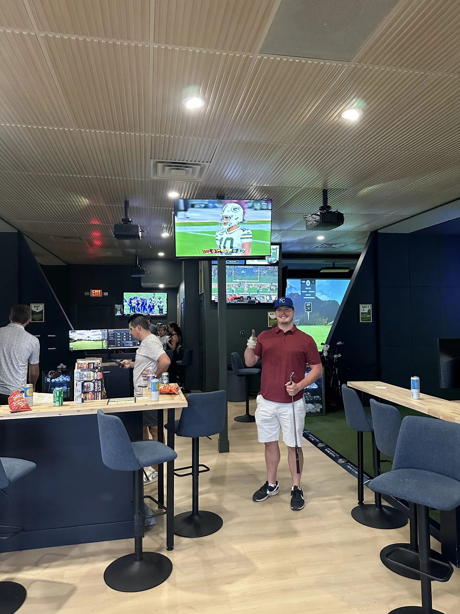 Private facility buyout event with the full All Seasons Indoor Golf Club space reserved for a large group in Kansas City